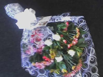 Funeral Flowers in cellophane