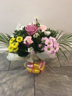 Pinks and yellow florist choice bouquet