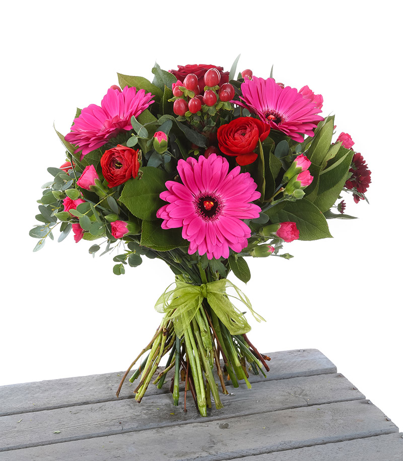 Eco wrapped tied bunch in red and cerise